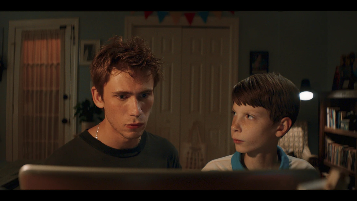 Brad and Griffin at the desk